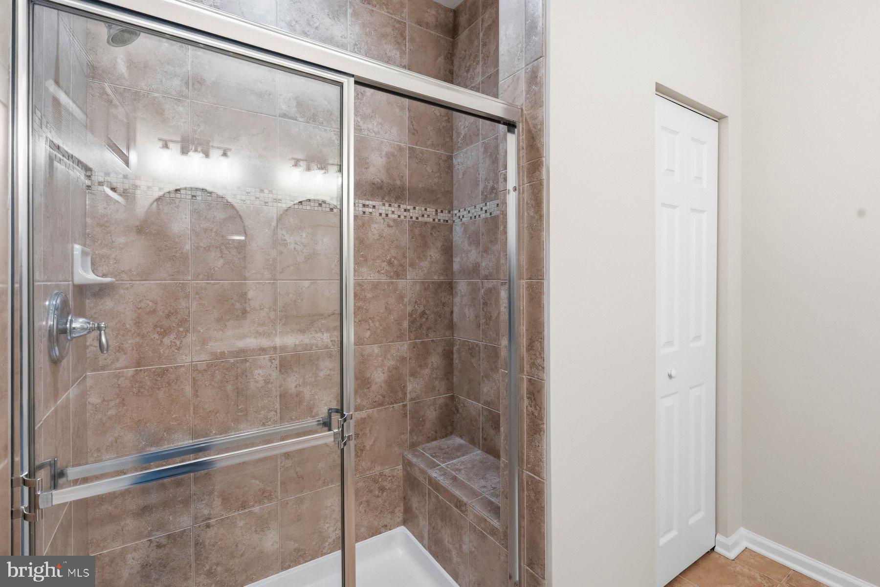 637 Wallingford Road, Unit 401 Bel Air, MD 21014 - Photo 21 of 28 Sleek modern shower with elegant tiles.