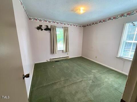 543 Stockyard Road Staley, NC 27355 - Photo 7 of 11 wooden floor in an empty room with a window