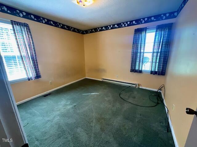 543 Stockyard Road Staley, NC 27355 - Photo 9 of 11 an empty room with a window