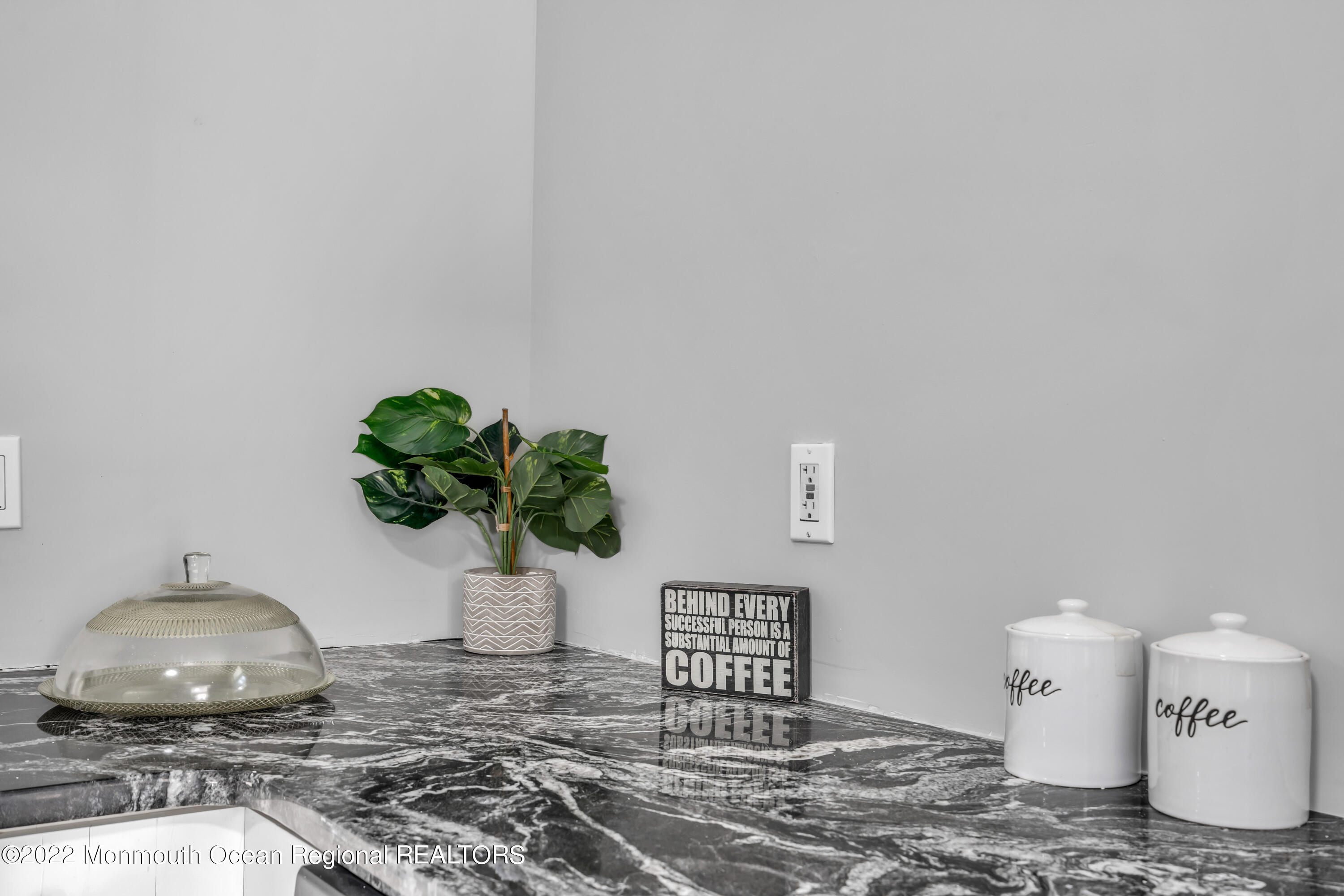 2440 Steiner Road Manchester Township, NJ 08759 - Photo 34 of 59 a vase of flowers sitting on a table