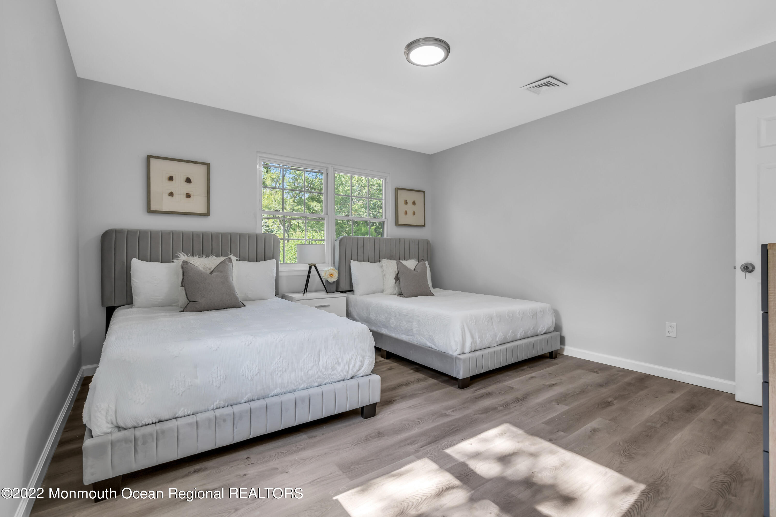 2440 Steiner Road Manchester Township, NJ 08759 - Photo 48 of 59 a bedroom with bed and a window