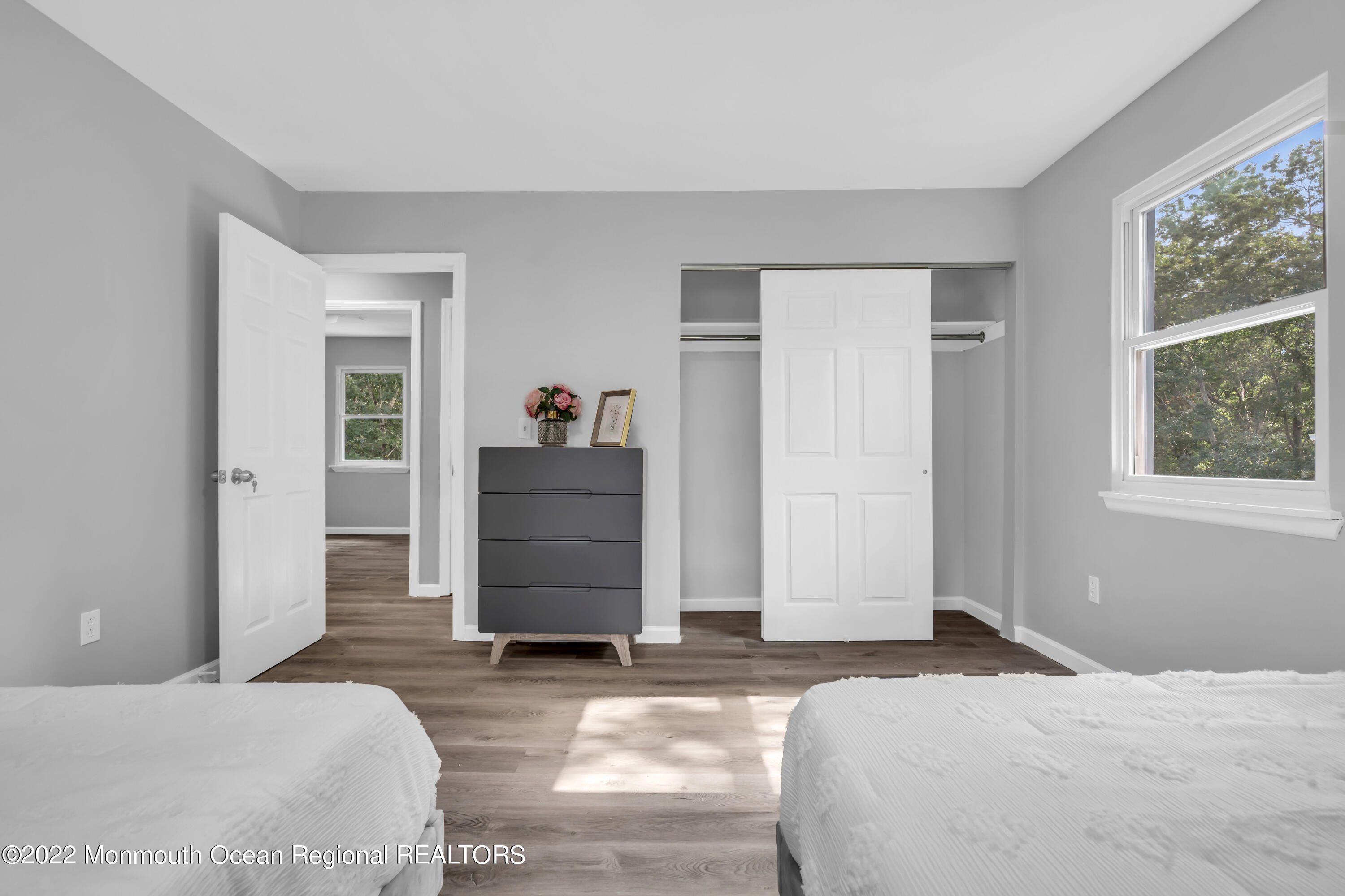 2440 Steiner Road Manchester Township, NJ 08759 - Photo 50 of 59 a bedroom with a bed and wooden floor