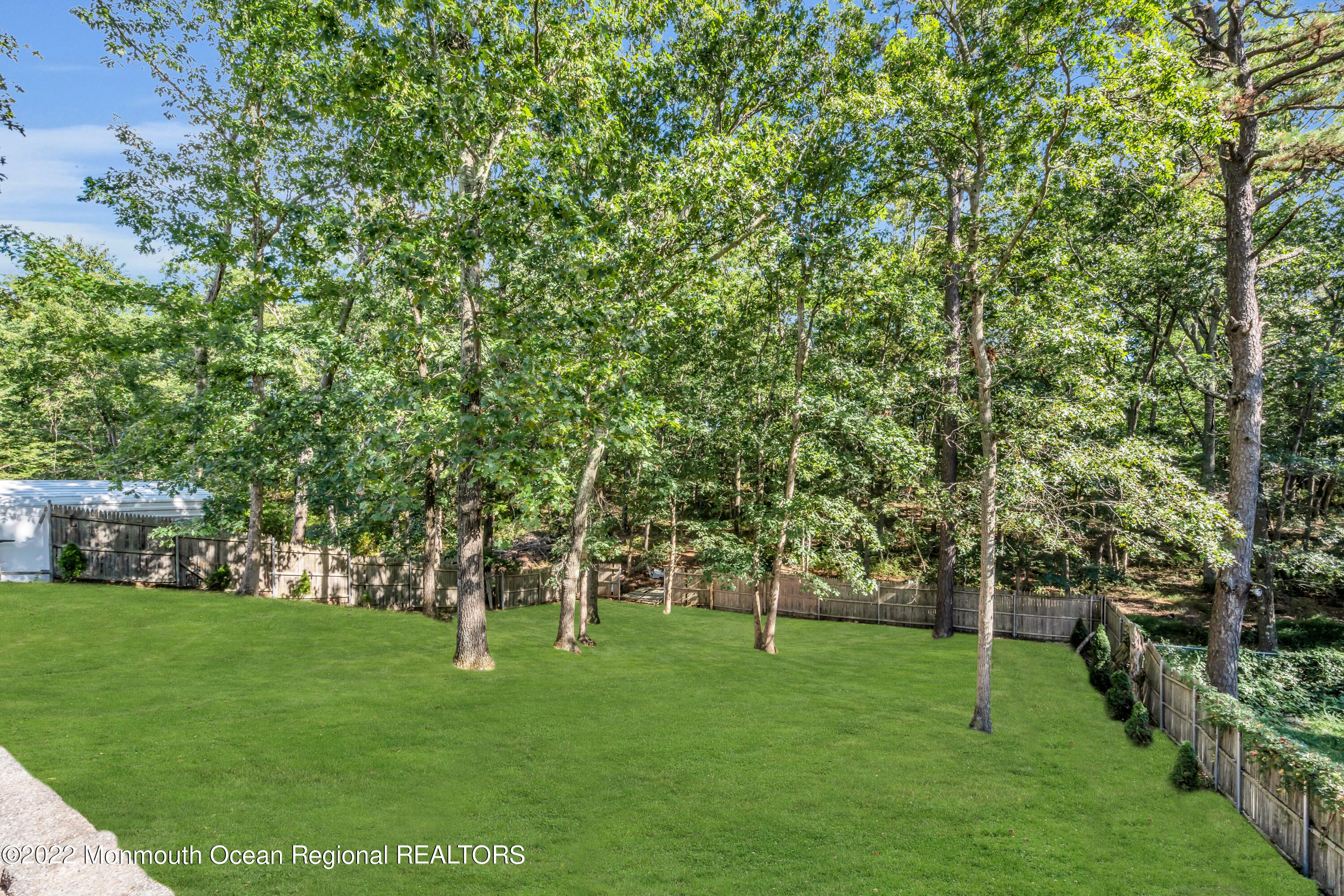 2440 Steiner Road Manchester Township, NJ 08759 - Photo 54 of 59 a green field with lots of trees