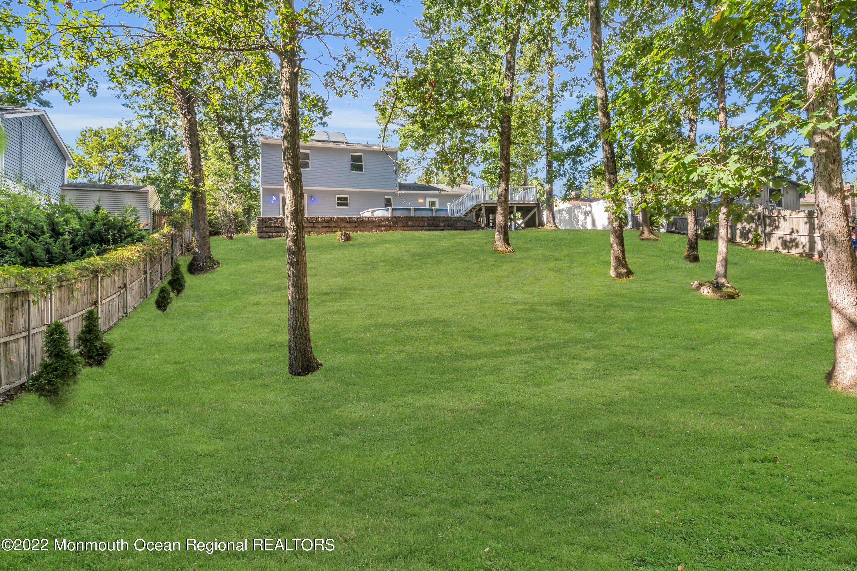 2440 Steiner Road Manchester Township, NJ 08759 - Photo 57 of 59 a view of a house with a backyard