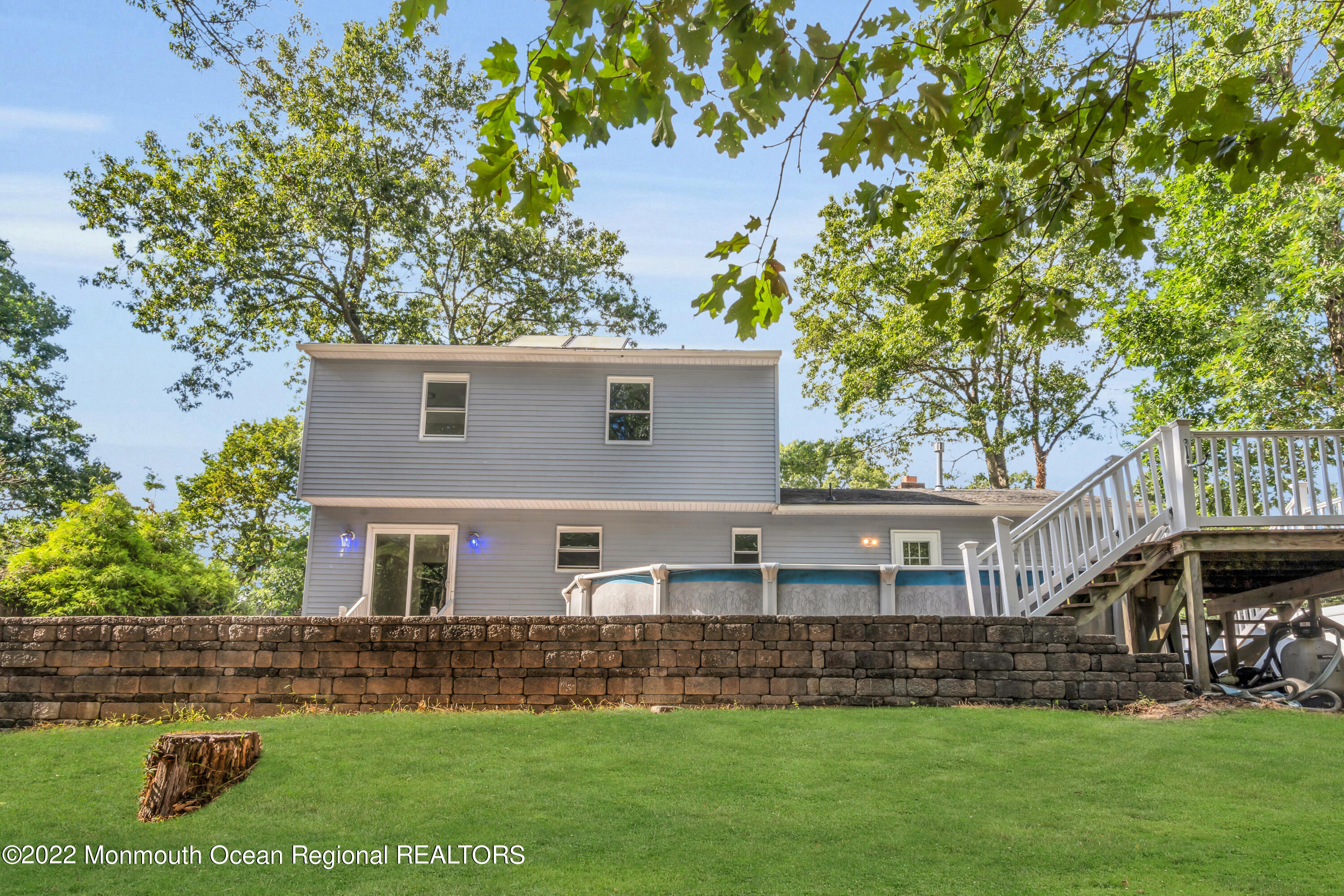 2440 Steiner Road Manchester Township, NJ 08759 - Photo 59 of 59 front view of a house with a yard