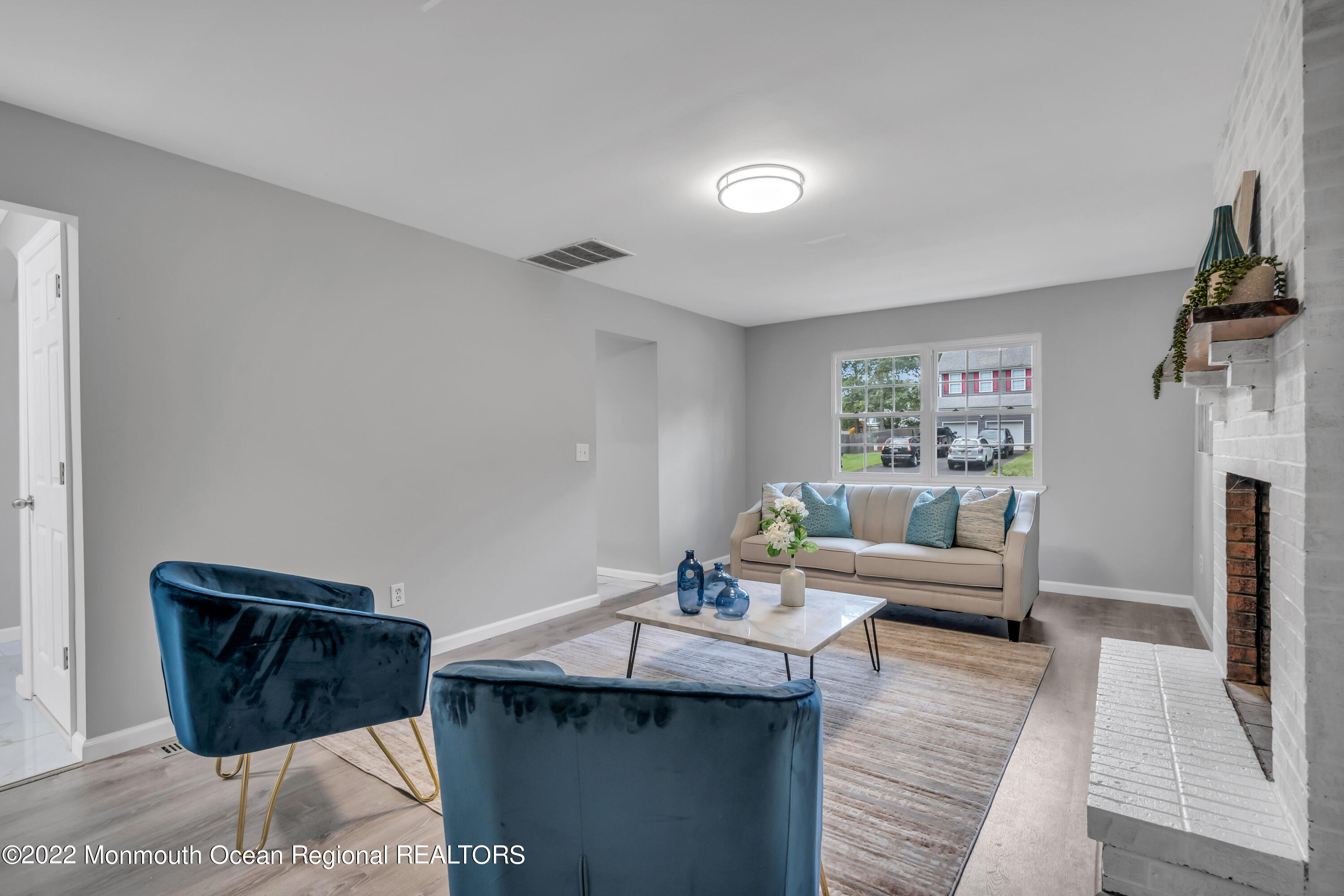2440 Steiner Road Manchester Township, NJ 08759 - Photo 9 of 59 a living room with furniture and a wooden floor