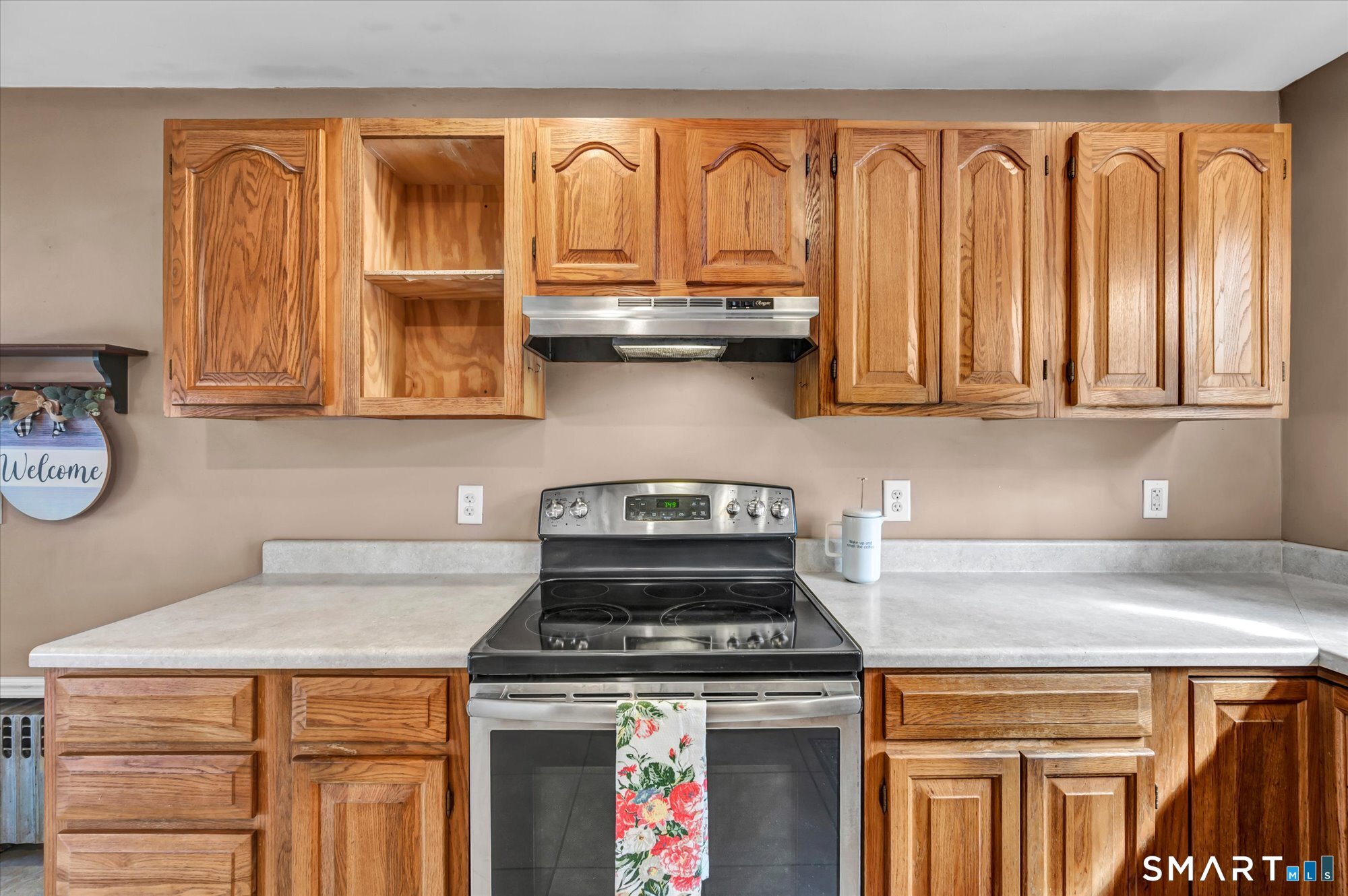 73 Sterling Hill Road Plainfield, CT 06354 - Photo 12 of 35 a kitchen with stainless steel appliances granite countertop a stove and a microwave