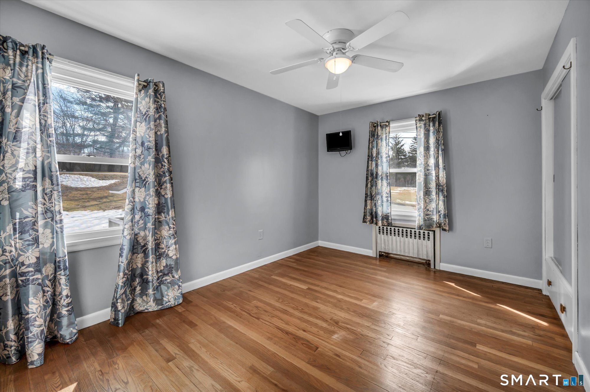 73 Sterling Hill Road Plainfield, CT 06354 - Photo 21 of 35 wooden floor in an empty room with a window