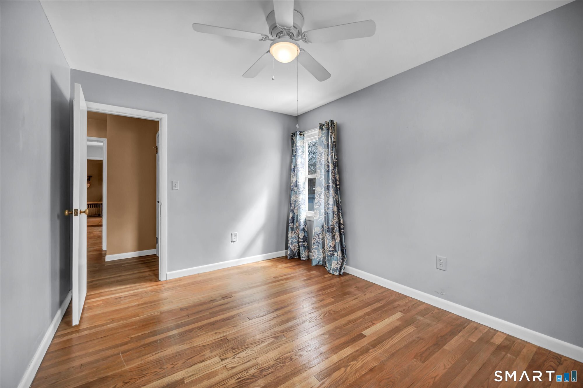 73 Sterling Hill Road Plainfield, CT 06354 - Photo 23 of 35 wooden floor in an empty room with a window