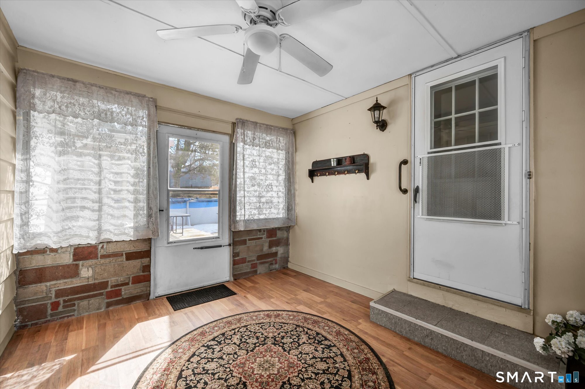 73 Sterling Hill Road Plainfield, CT 06354 - Photo 29 of 35 a room with furniture and a rug