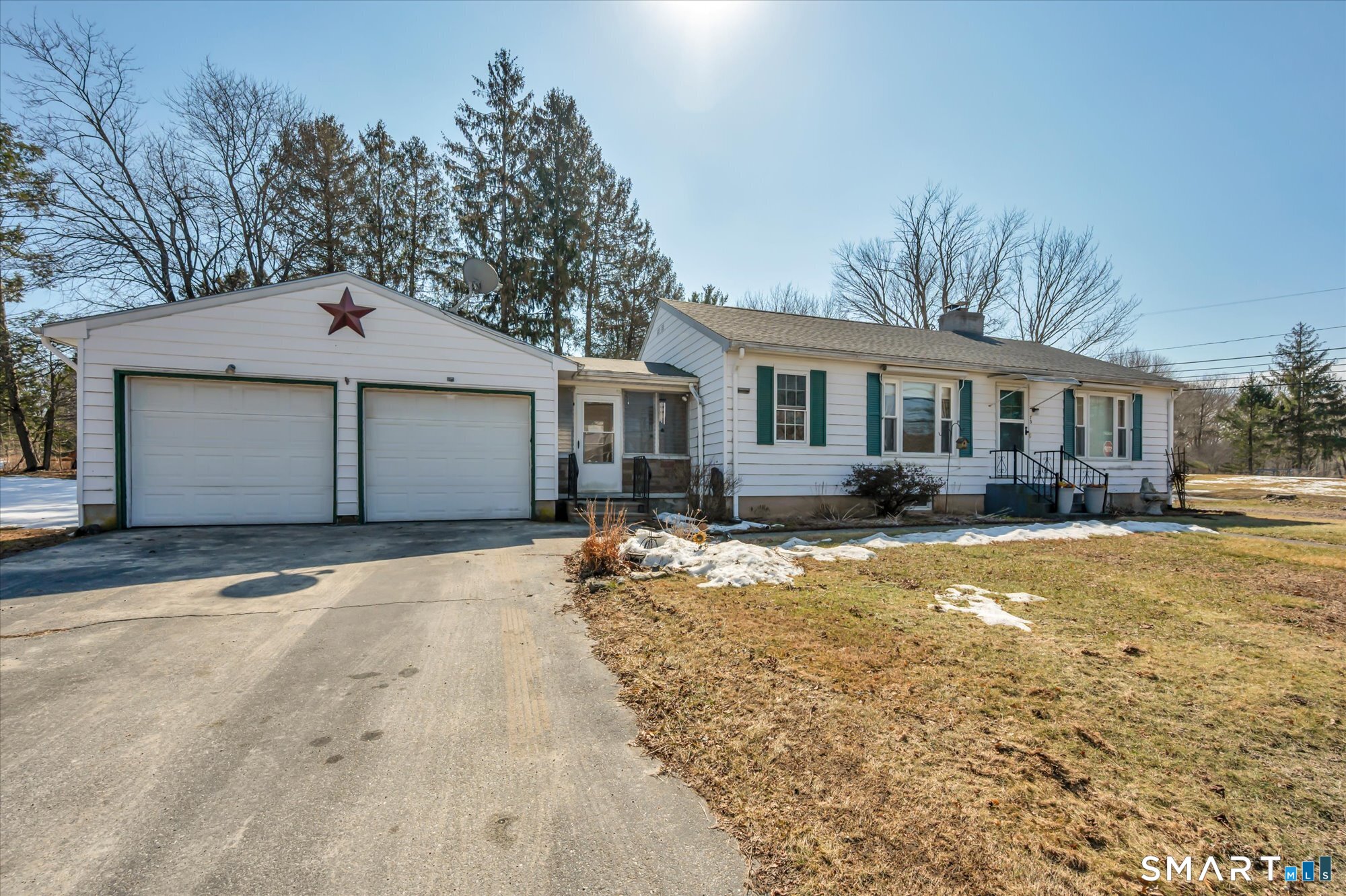 73 Sterling Hill Road Plainfield, CT 06354 - Photo 32 of 35 a front view of a house with a yard and garage