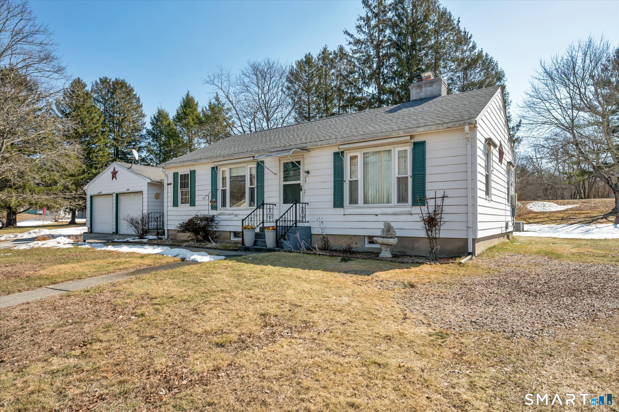 73 Sterling Hill Road Plainfield, CT 06354 - Photo 4 of 35 a front view of a house with yard patio and fire pit
