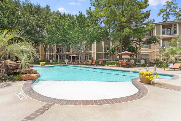 a view of a house with a swimming pool
