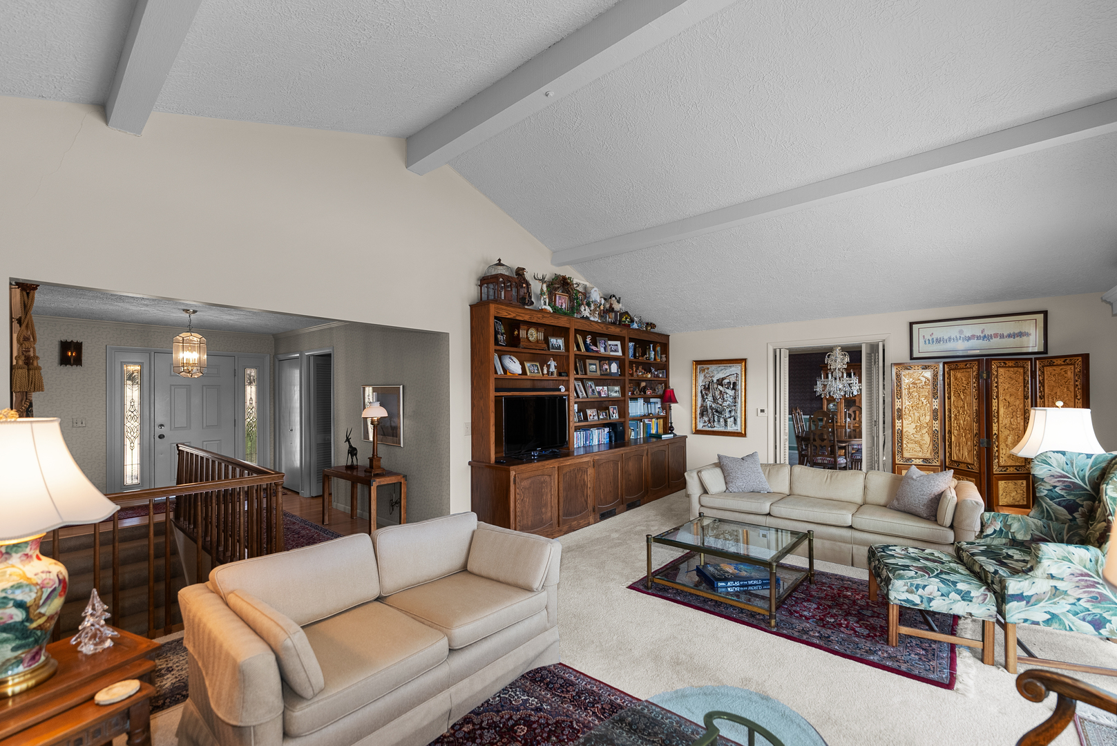 6026 95th Avenue West Taylor Ridge, IL 61284 - Photo 14 of 37 a living room with furniture and a large window