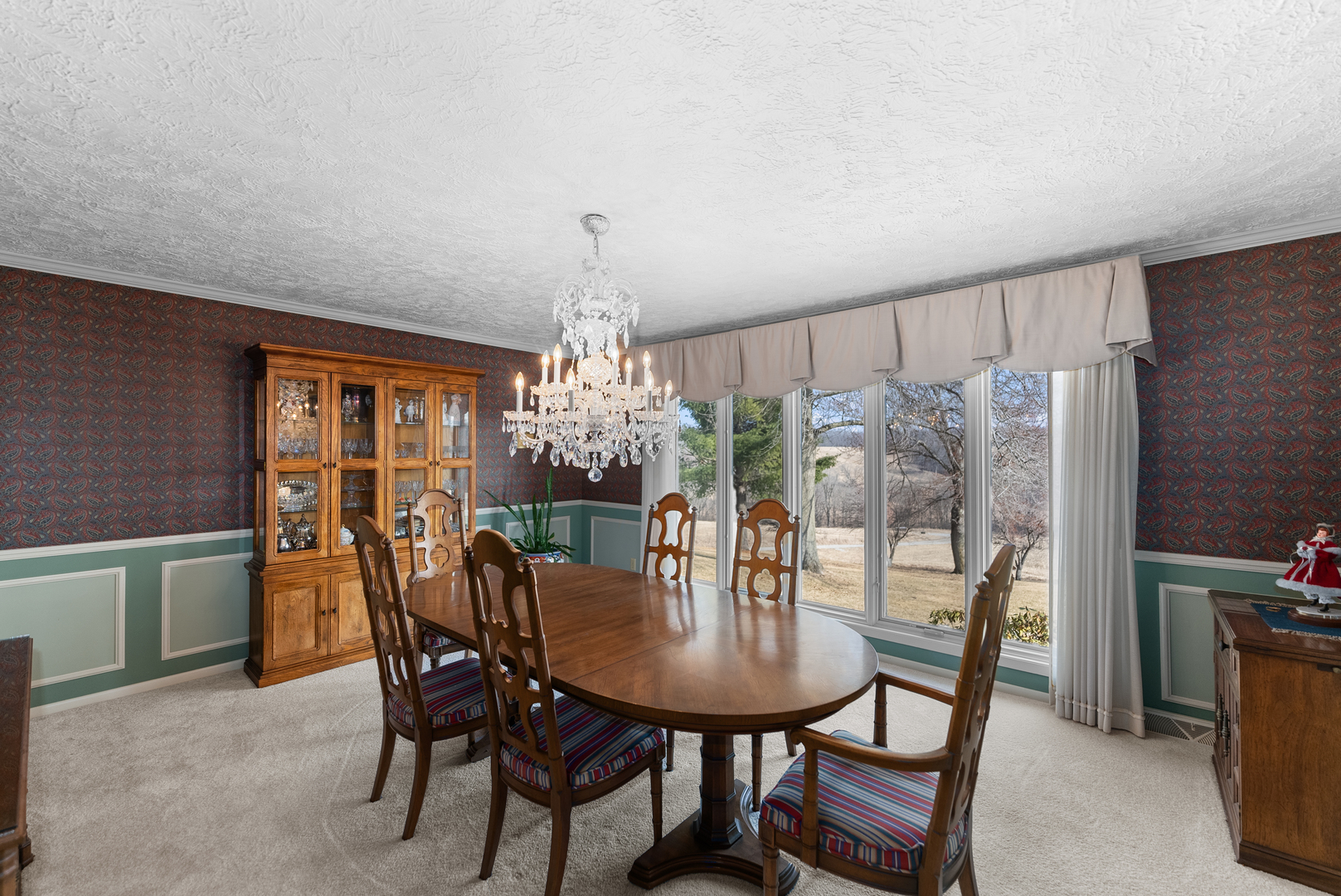 6026 95th Avenue West Taylor Ridge, IL 61284 - Photo 15 of 37 a view of a dining room with furniture window and chandelier