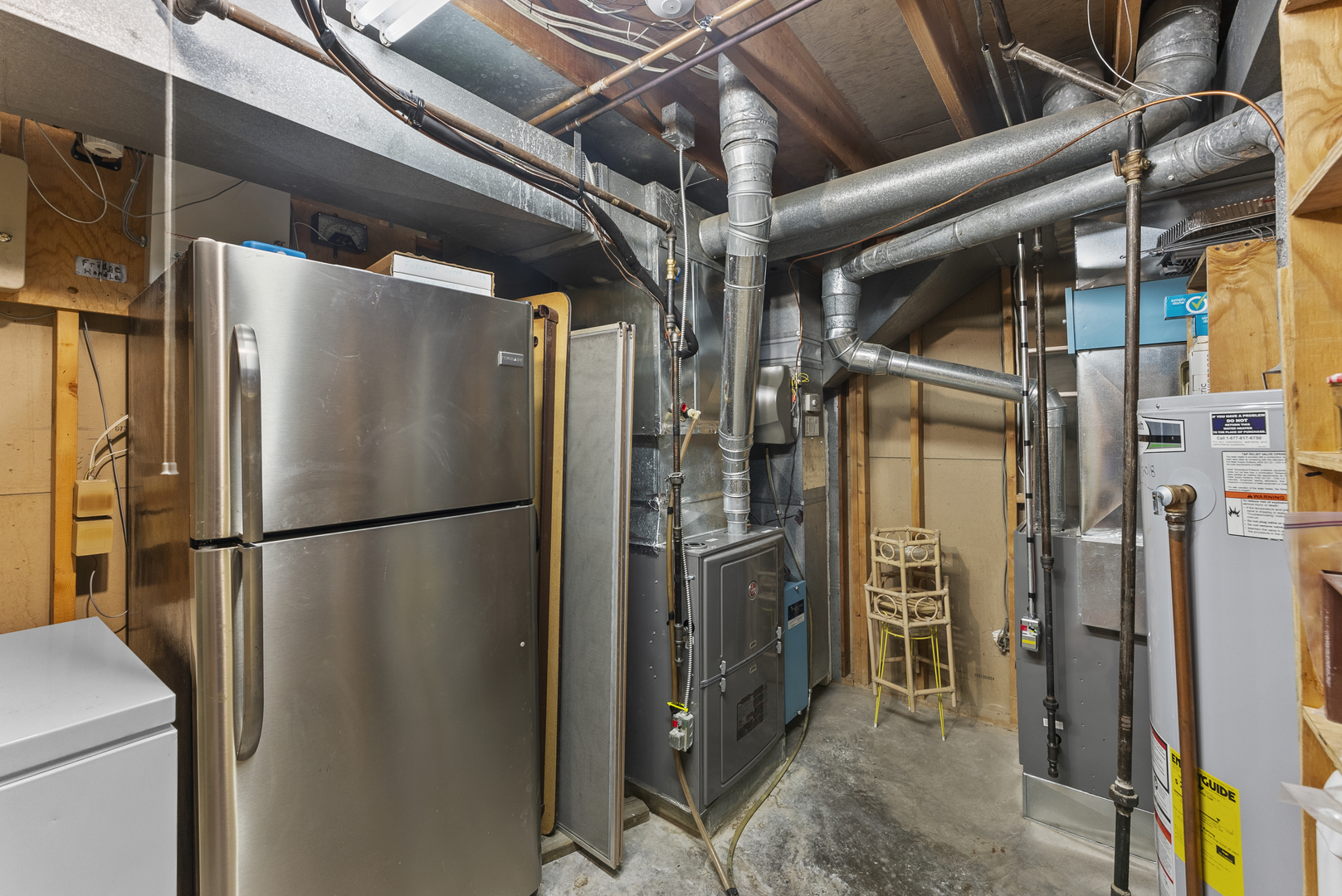 6026 95th Avenue West Taylor Ridge, IL 61284 - Photo 31 of 37 a view of walk in closet with clothes and shoes