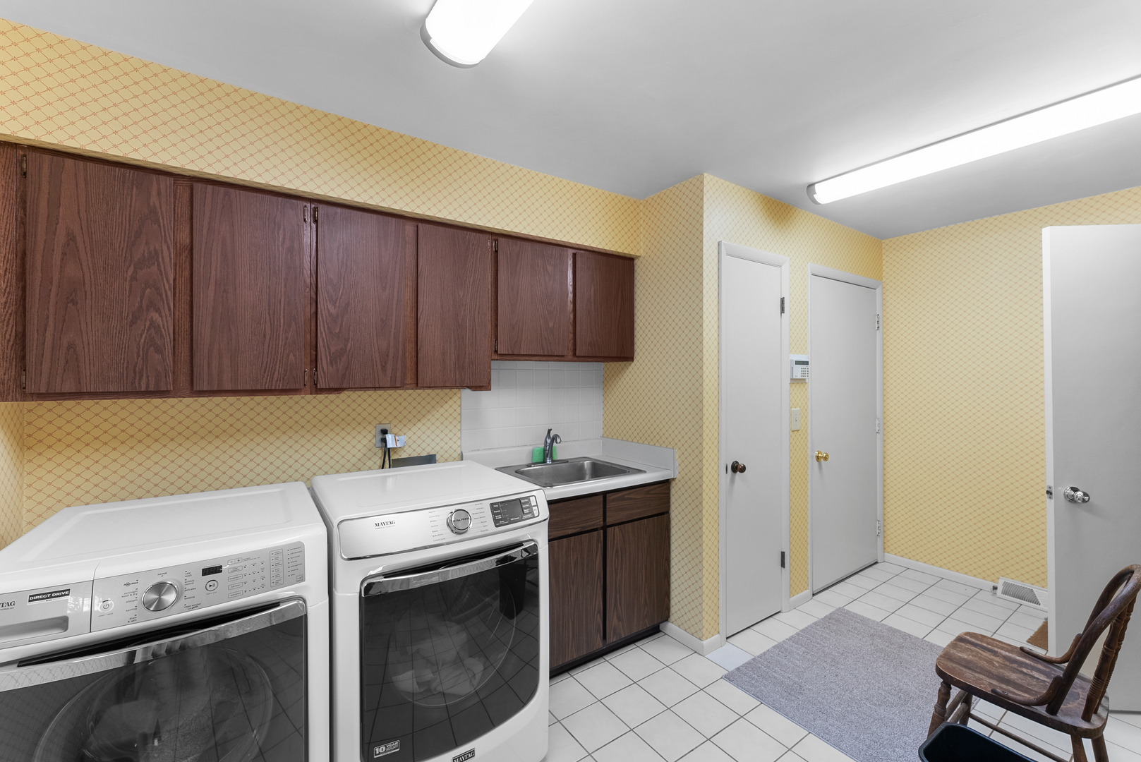 6026 95th Avenue West Taylor Ridge, IL 61284 - Photo 8 of 37 a view of a kitchen with a sink