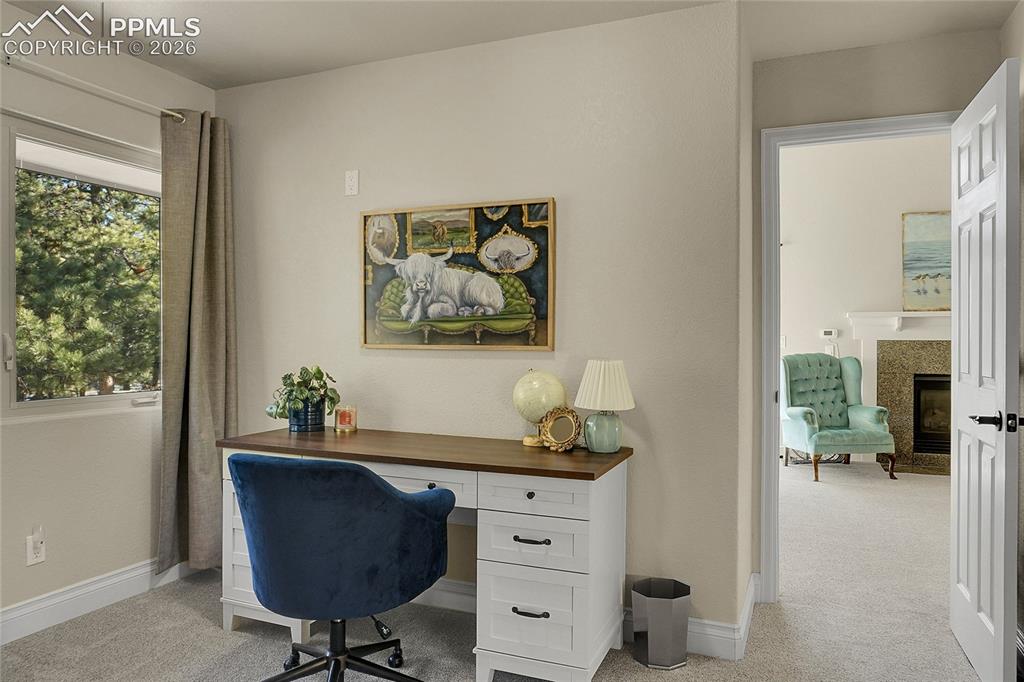 17350 Goshawk Road Colorado Springs, CO 80908 - Photo 20 of 50 a living room with furniture and a window