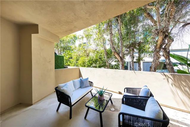 a spacious bathroom with a granite countertop tub sink and mirror