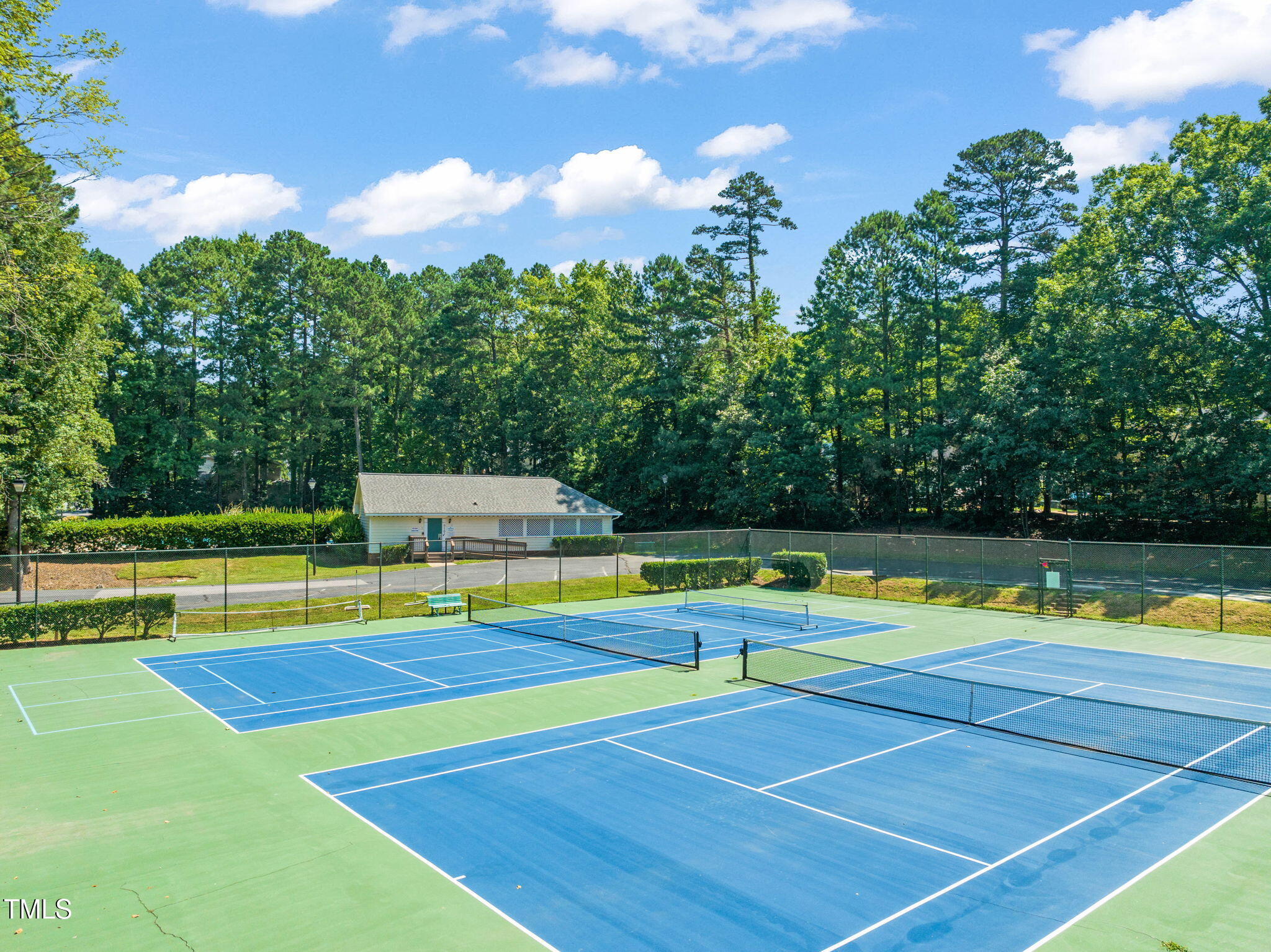 6051 Epping Forest Drive Raleigh, NC 27613 - Photo 17 of 26 a view of a swimming pool with a yard