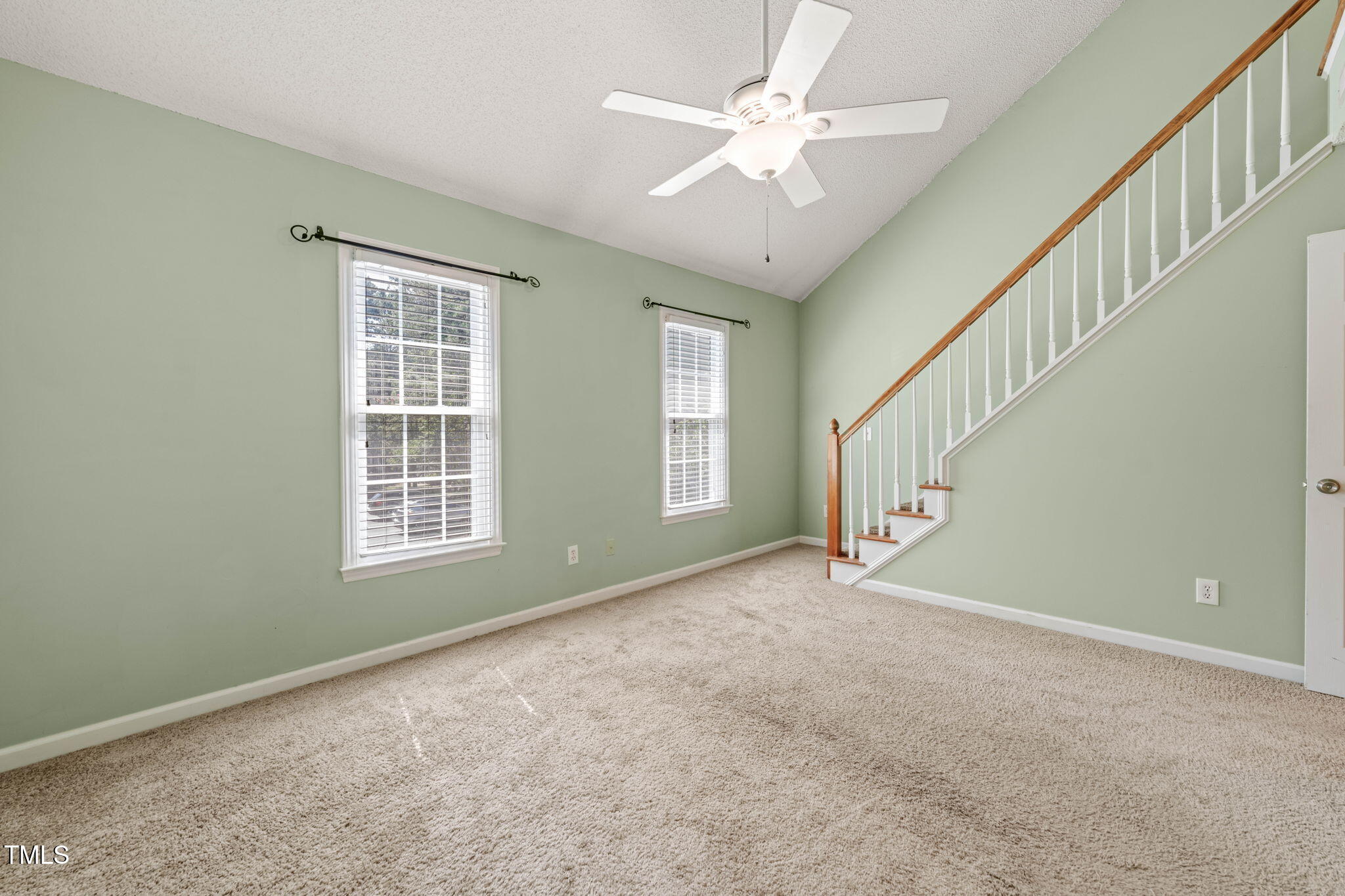 6051 Epping Forest Drive Raleigh, NC 27613 - Photo 21 of 26 a view of an empty room with a window