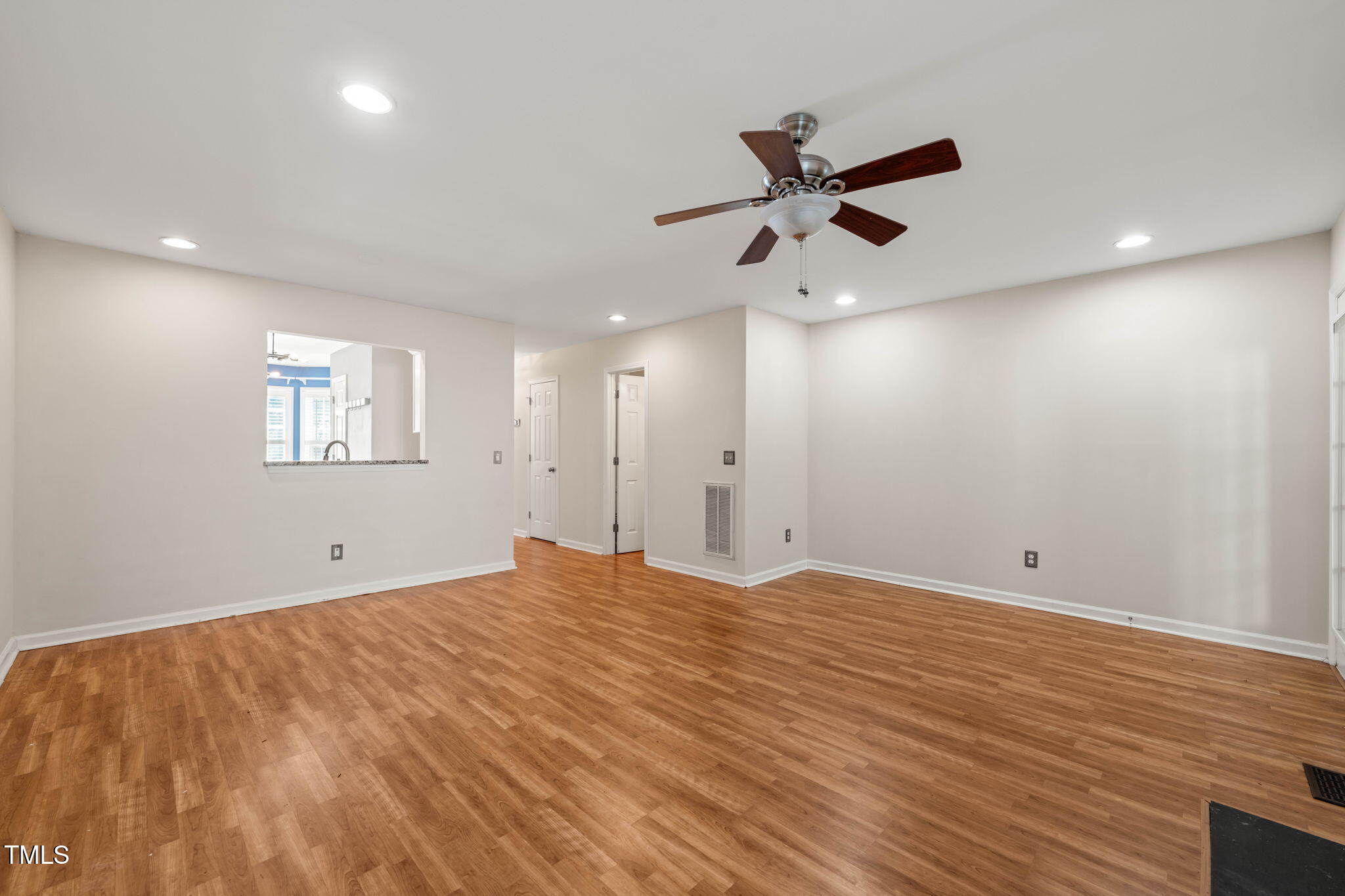 6051 Epping Forest Drive Raleigh, NC 27613 - Photo 4 of 26 a view of an empty room