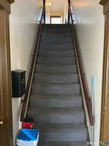 a view of a room with a large window