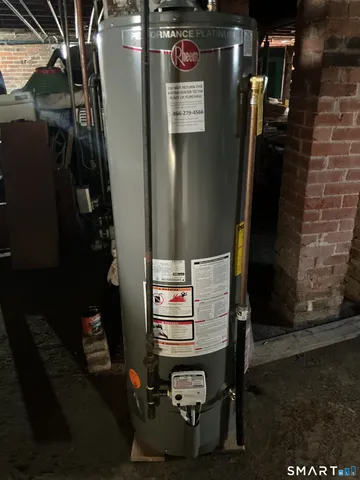 a front view of a house with a road