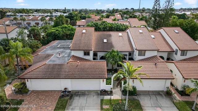 a kitchen with cabinets and white appliances