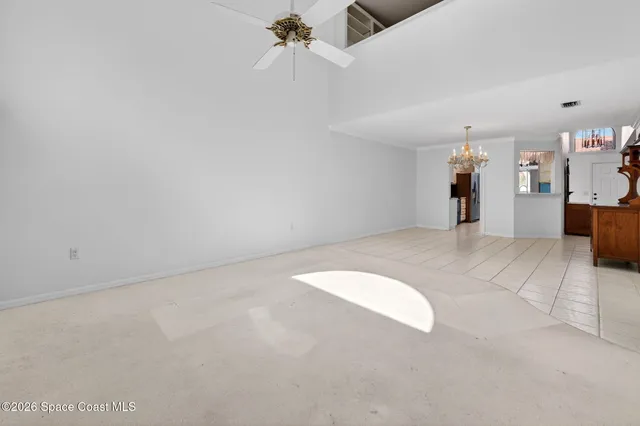 a view of a storage & utility room with sink dryer and washer