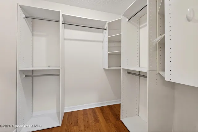 a view of living room with furniture and window