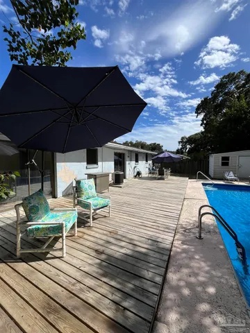 a view of a terrace with sitting area