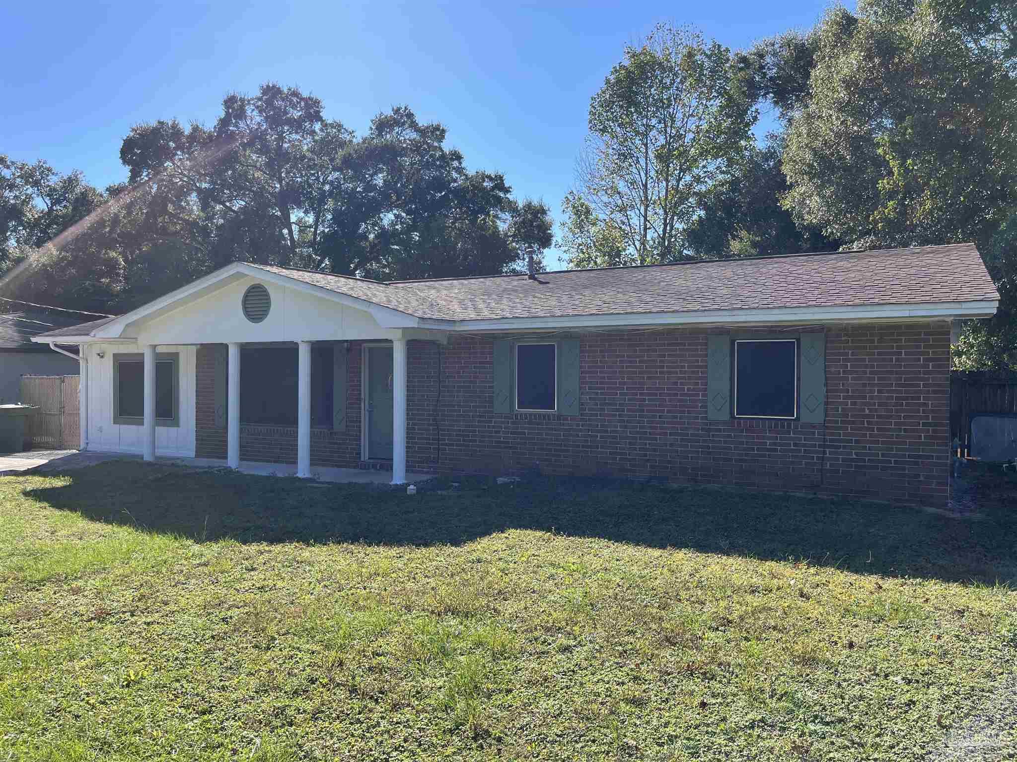 4511 St Nazaire Road Pensacola, FL 32505 - Photo 3 of 21 a front view of a house with a yard