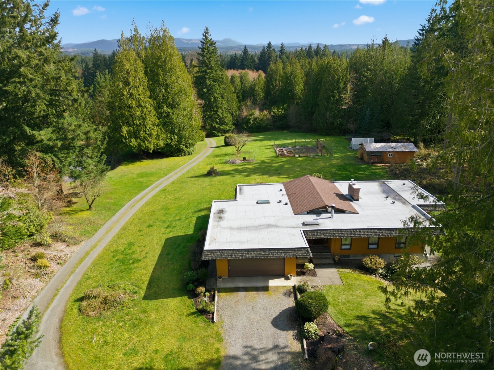 14608 A P Tubbs Road East Buckley, WA 98321 - Photo 26 of 39 an aerial view of a house with pool big yard and large trees