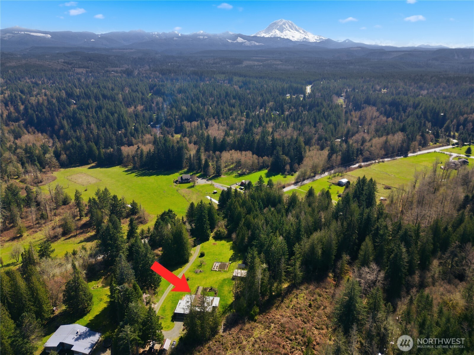 14608 A P Tubbs Road East Buckley, WA 98321 - Photo 29 of 39 a view of a houses with a yard