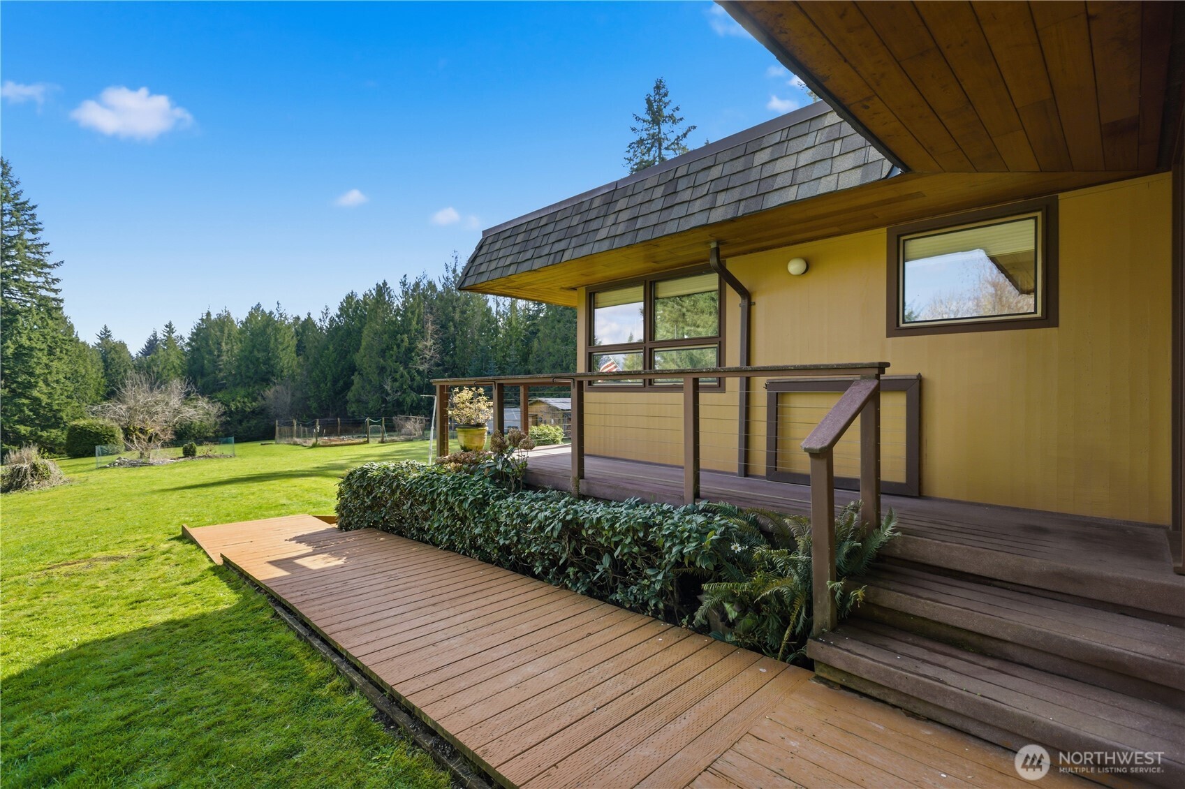 14608 A P Tubbs Road East Buckley, WA 98321 - Photo 32 of 39 a view of a backyard with sitting area