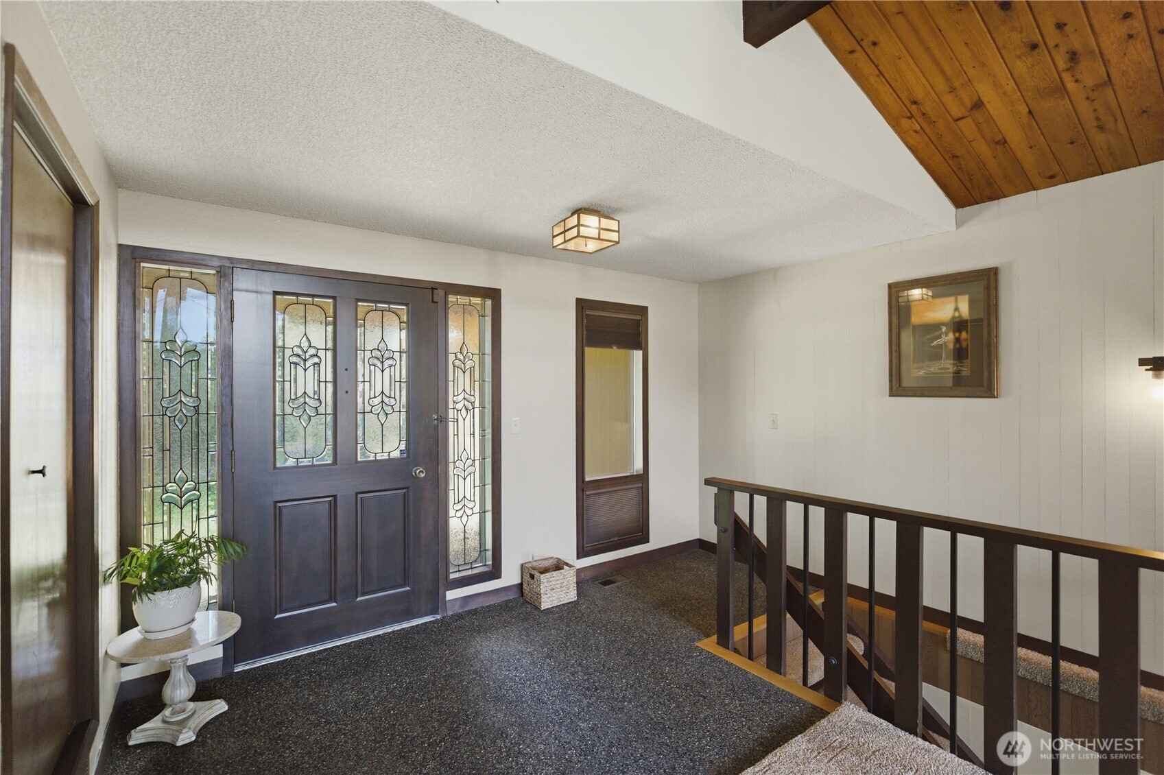 14608 A P Tubbs Road East Buckley, WA 98321 - Photo 10 of 39 a view of a hallway with furniture and windows