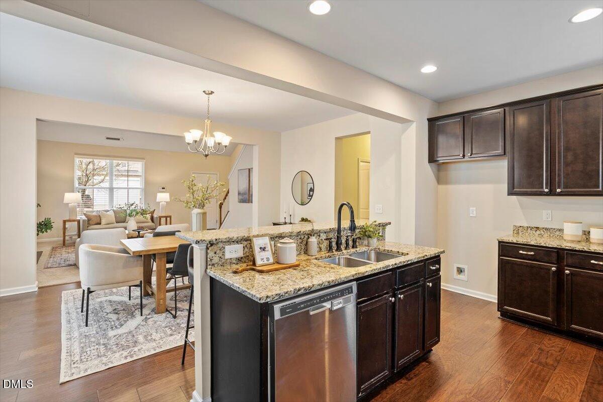 2105 Pear Tree Lane Durham, NC 27703 - Photo 12 of 35 a kitchen with a sink and cabinets