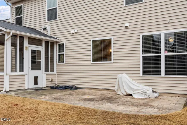 a view of a house with a patio