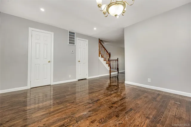 a kitchen with stainless steel appliances a sink stove and cabinets