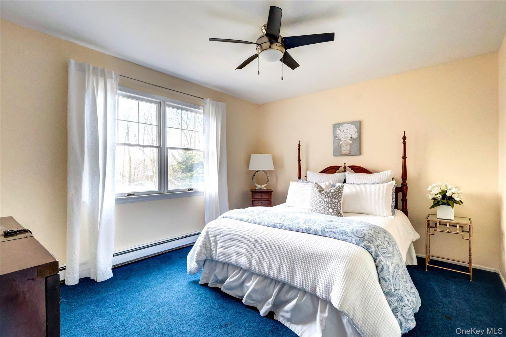 6 Samuels Path Miller Place, NY 11764 - Photo 32 of 47 a bedroom with a bed and a window