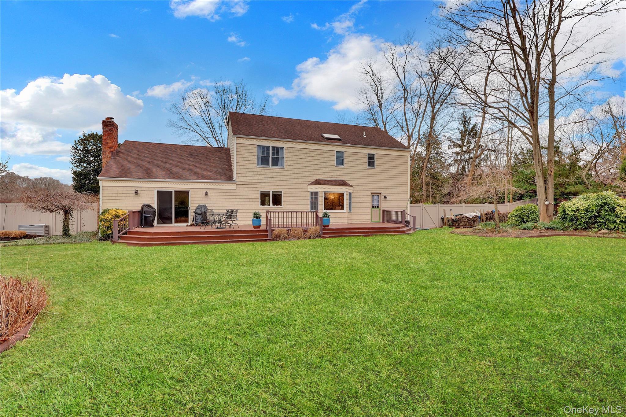 6 Samuels Path Miller Place, NY 11764 - Photo 45 of 47 a view of a house with backyard