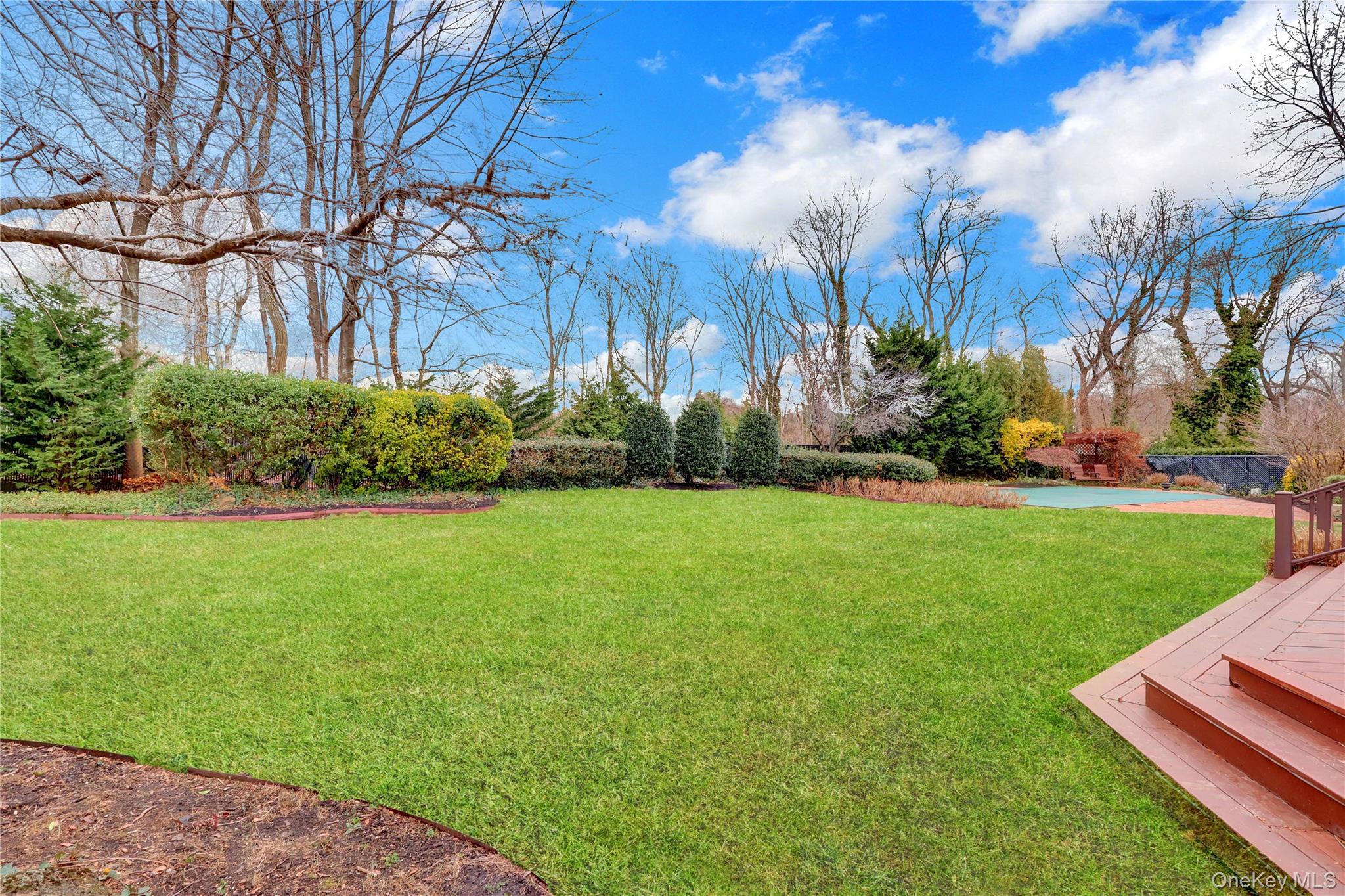 6 Samuels Path Miller Place, NY 11764 - Photo 47 of 47 a front view of a house with a yard