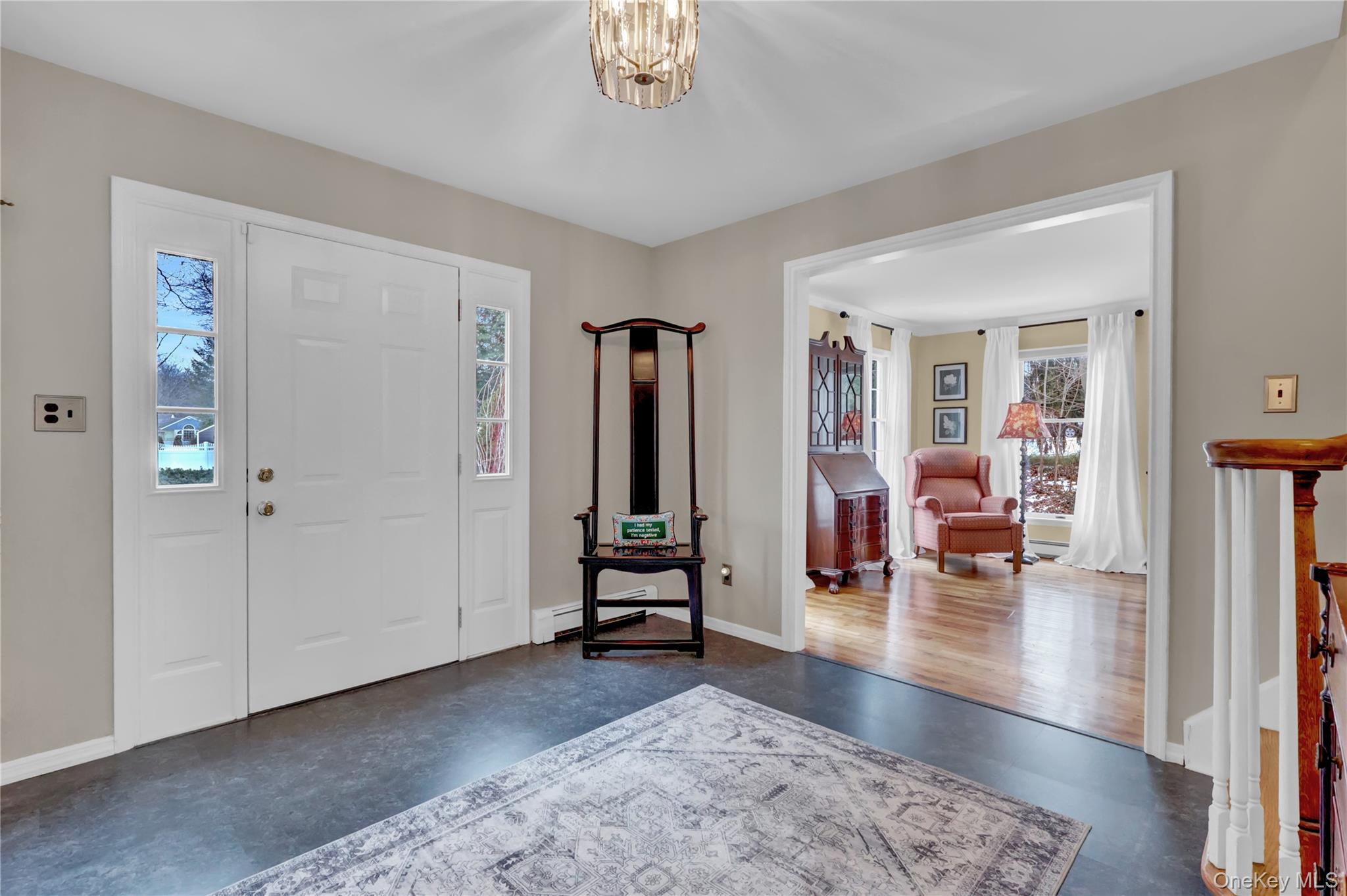 6 Samuels Path Miller Place, NY 11764 - Photo 5 of 47 a living room with furniture and wooden floor