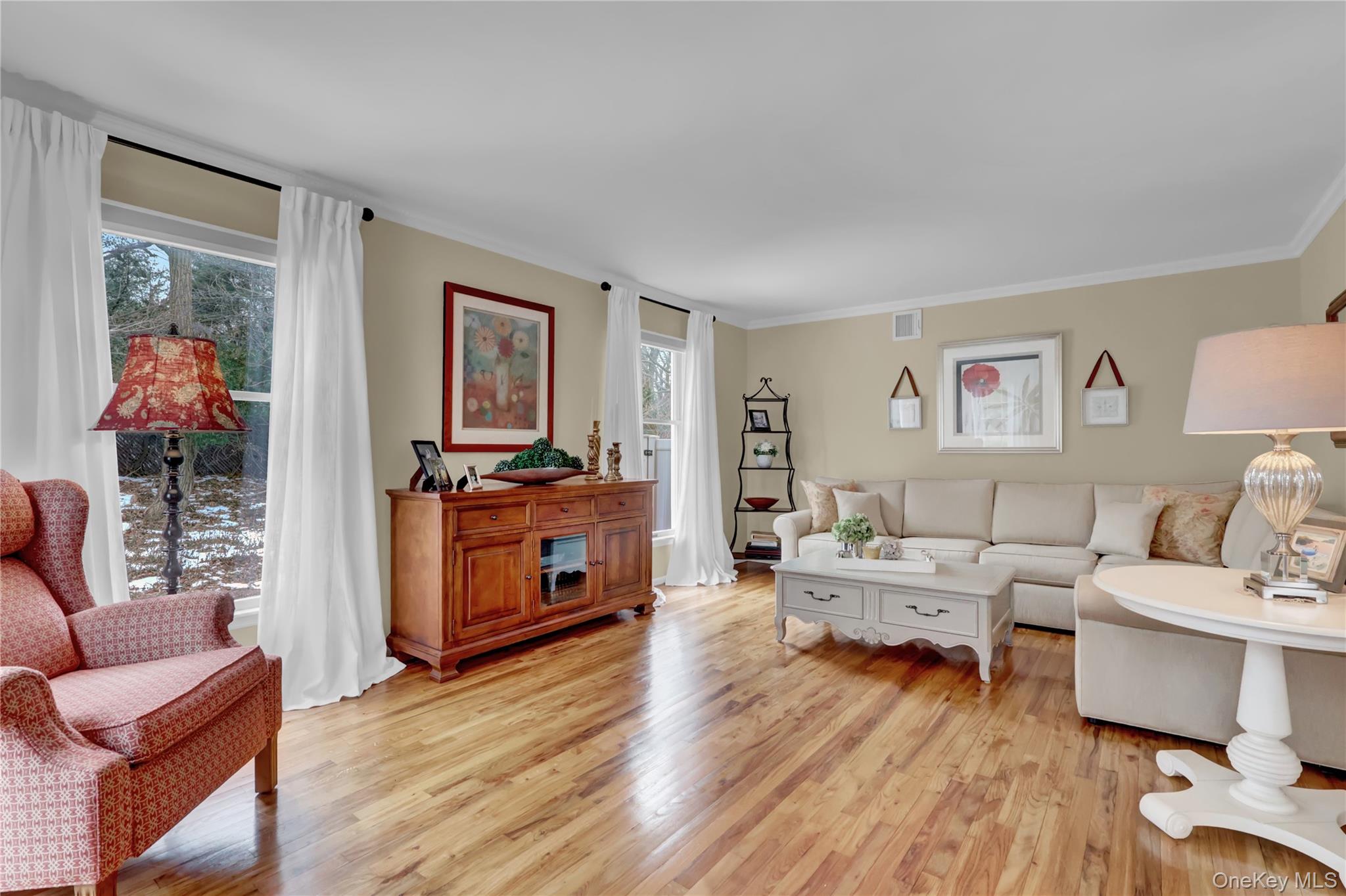 6 Samuels Path Miller Place, NY 11764 - Photo 6 of 47 a living room with furniture and wooden floor