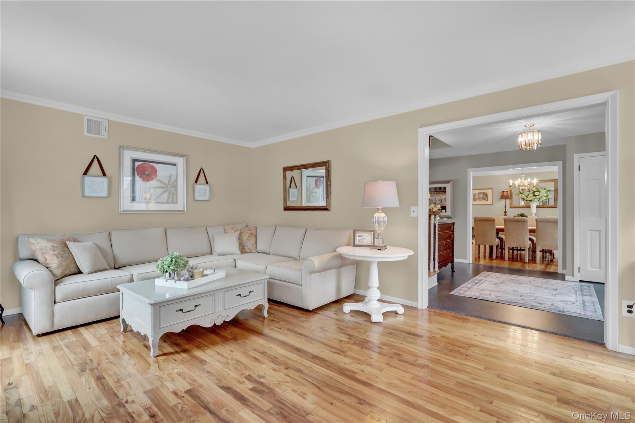 6 Samuels Path Miller Place, NY 11764 - Photo 7 of 47 a living room with furniture or wooden floor and a large window