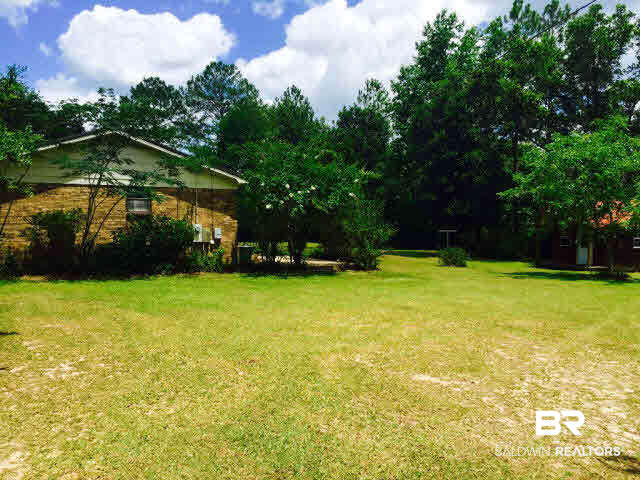 39660 Hannis Williams Road Bay Minette, AL 36507 - Photo 24 of 32 For Sale: 39660 Hannis Williams Road, Bay Minette, AL 36507 Side Yard