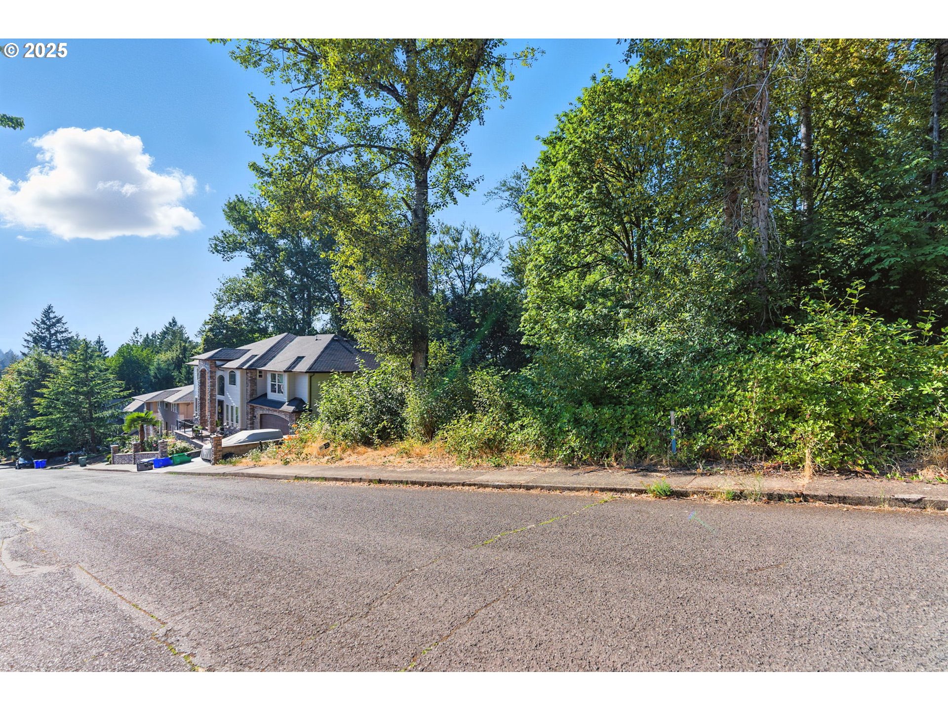 14745 Southeast Duke Street Portland, OR 97236 - Photo 3 of 19 a view of road and yard