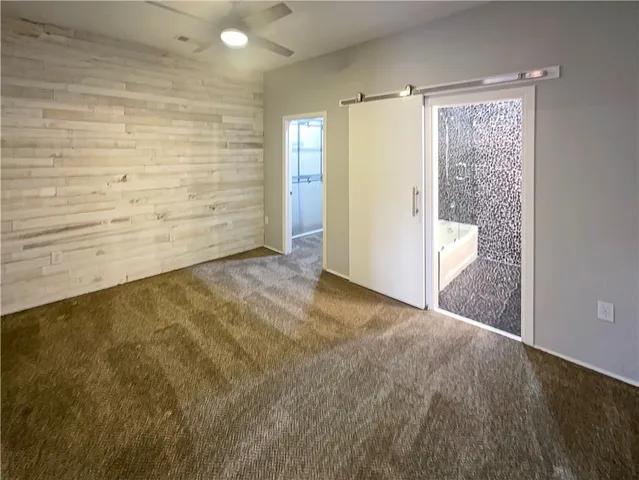 a bathroom with a sink toilet and a mirror