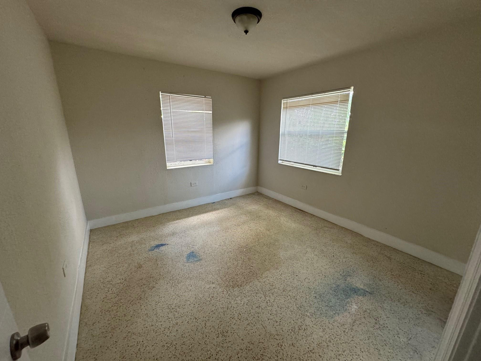 7979 Northwest 1st Place, Unit 2 Miami, FL 33150 - Photo 12 of 15 an empty room with a window